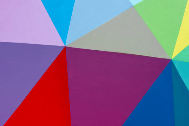 Brightly colored geometric background with color gradients and copy space - stock photo