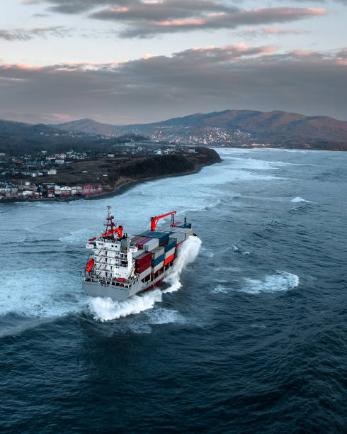 istock Container ship on stormy sea delivering cargo 1401964260