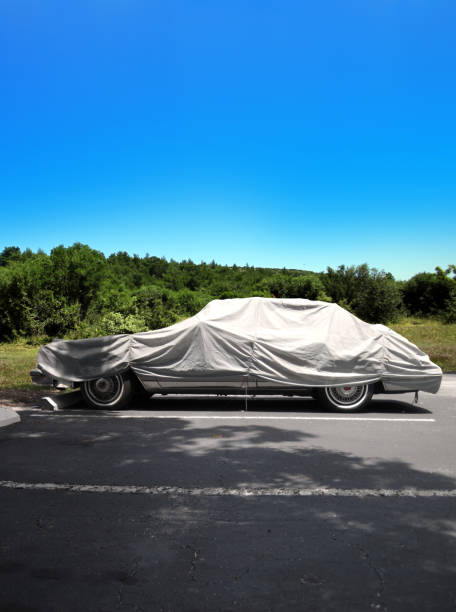istock Covered car in parking lot 1401964343
