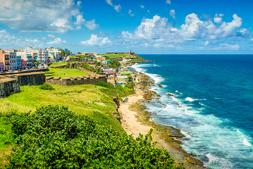 View of colorful Old San Juan (Viejo San Juan) and beach, Puerto Rico on a sunny day.