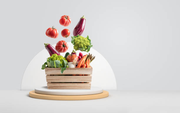 istock fresh vegetables falling into a wooden box on a pedestal with copy space 1401966928
