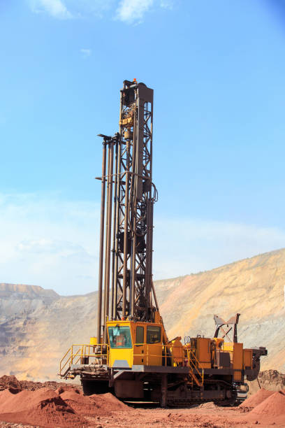 istock Machine for drilling wells in the quarry. 1401970288