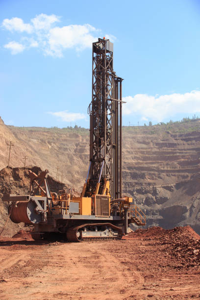 istock Machine for drilling wells in the quarry. 1401970323