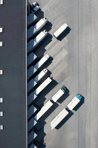 Trucks at the loading bay of a warehouse