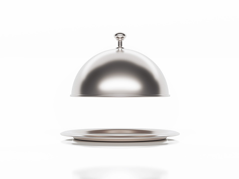 Silver platter sitting on white background. Horizontal composition with copy space. Clipping path is included.