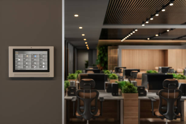 Smart Control System With App Icons On A Digital Screen In Modern Office With Blurred Background Smart Control System With App Icons On A Digital Screen In Modern Office With Blurred Background smart office stock pictures, royalty-free photos & images