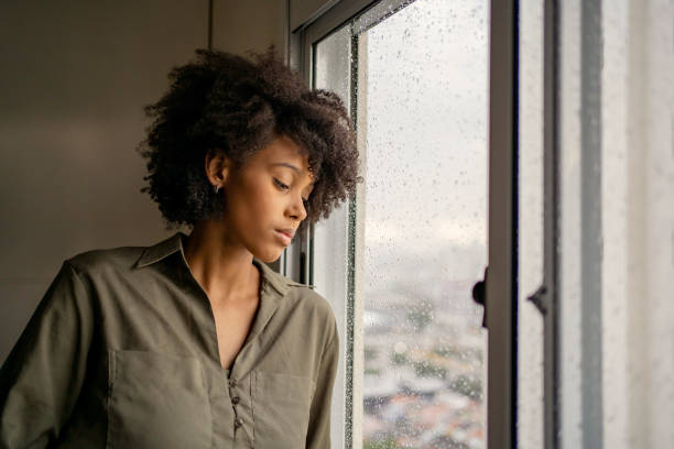istock Woman with depression at home 1401980383