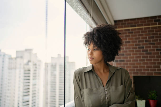 istock Woman with depression at home 1401980414