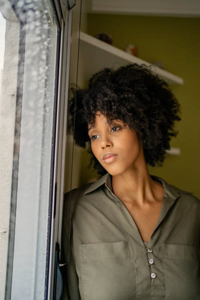 istock Woman with depression at home 1401982517
