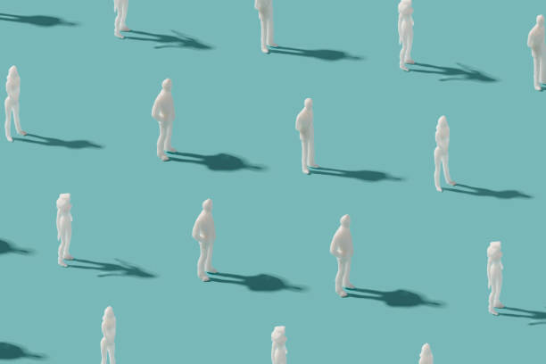 istock Standing human figurines on a pastel blue background. T 1401989243