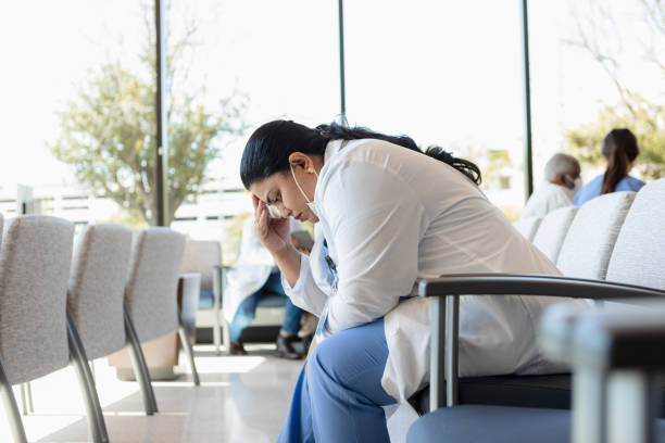 Female doctor is emotionally stressed after seeing patients all day