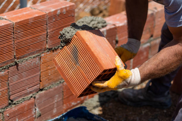 istock Masters who make concrete mortar and masonry in construction 1401998173