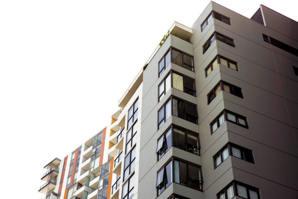 Modern apartment buildings, white background with copy space, full frame horizontal composition