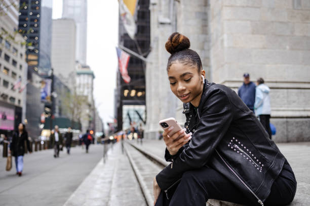 istock Young woman scrolling while waiting for a friend 1402004620