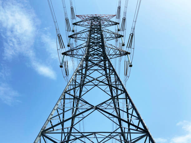 istock High voltage transformer, high voltage towers with sky background 1402010734
