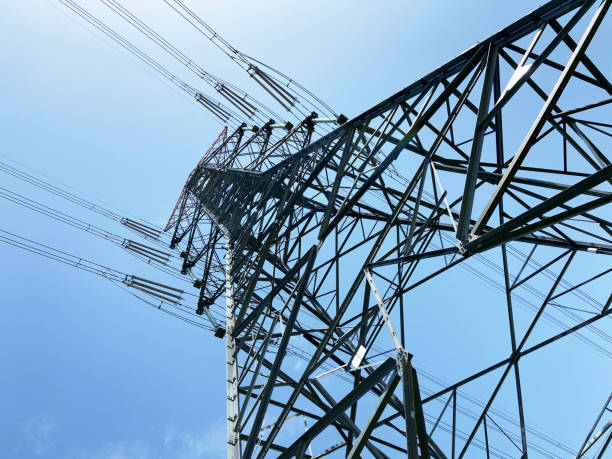 istock High voltage transformer, high voltage towers with sky background 1402011321