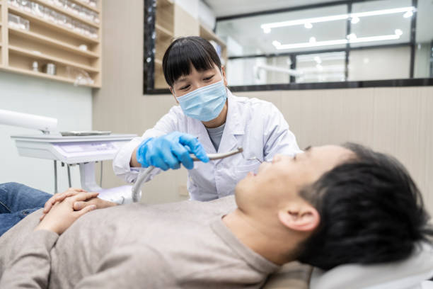 istock A professional female dentist is having a dental checkup. 1402015400