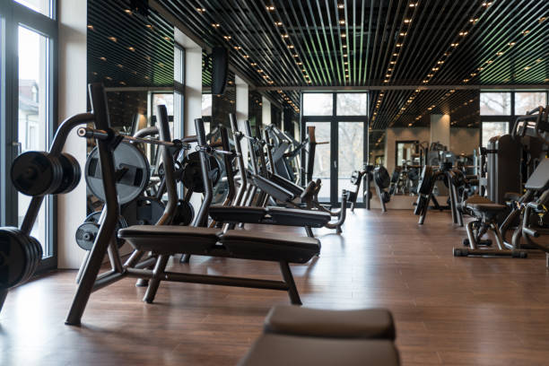 istock Large Modern Gym With Workout Equipment 1402015434