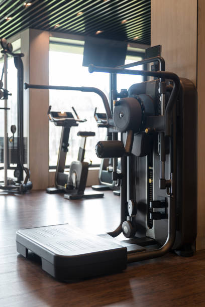 istock Large Modern Gym With Workout Equipment 1402015442
