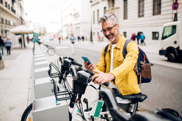 istock Mature tourist renting an e-bike 1402021305