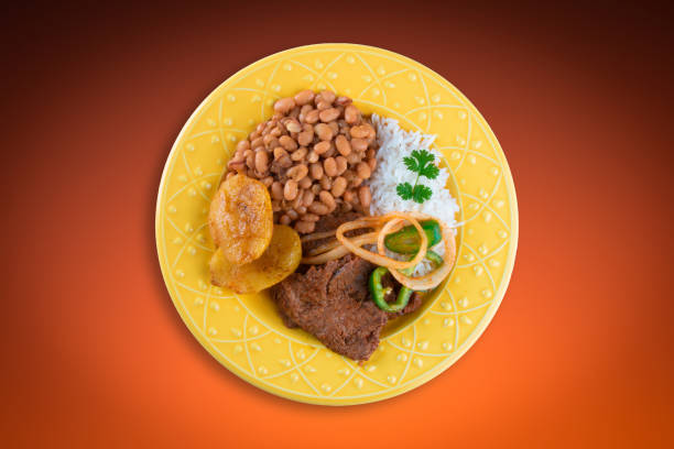 Traditional Brazilian dish. Beans and rice. Top view. Traditional Brazilian dish. Beans and rice. Top view.. beans and rice stock pictures, royalty-free photos & images