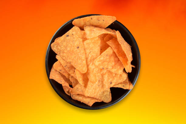 istock bowl with crunchy cheese chips and colorful gradient background 1402021522