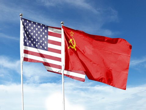 Twin Flags Soviet Russia and USA Waving Flags with Textured Background