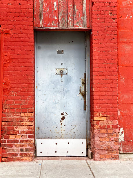 istock Red Brick Wall and old door 1402044337