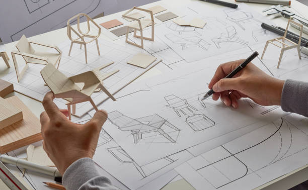 istock Designer sketching drawing design development product plan draft chair armchair Wingback Interior furniture prototype manufacturing production. designer studio concept . 1402046532