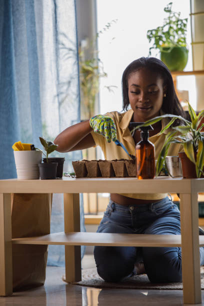 istock Doing some sustainable gardening in the apartment 1402046698