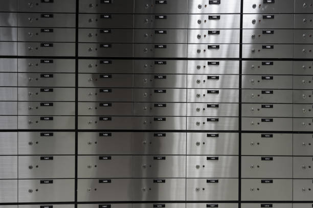 istock Safe deposit boxes of an a bank. Metal safe box panel wall. 1402053598