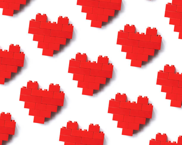 istock Red hearts from blocks isolated on white background, minimal geometric pattern 1402057990