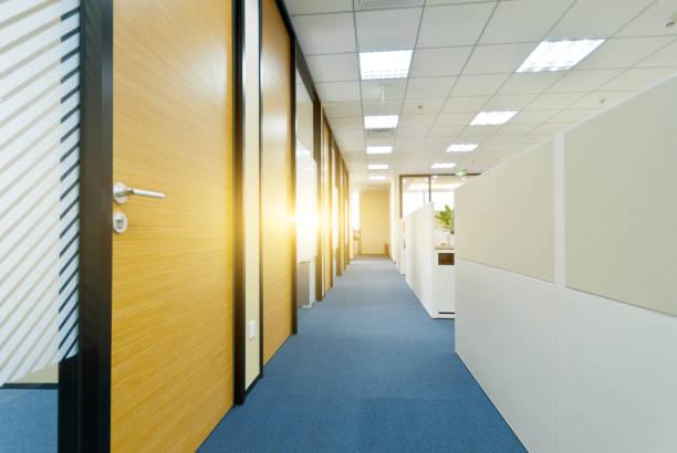 istock Working area in modern office with carpet floor and meeting room 1402058016