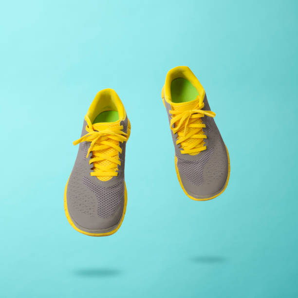 istock Sneakers walking in mid-air 1402058116