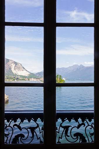 Lombardy, Italy - May 20, 2022: Balcony view on Lago Maggiore, Isola Bella island, Borromeo palace, Stresa