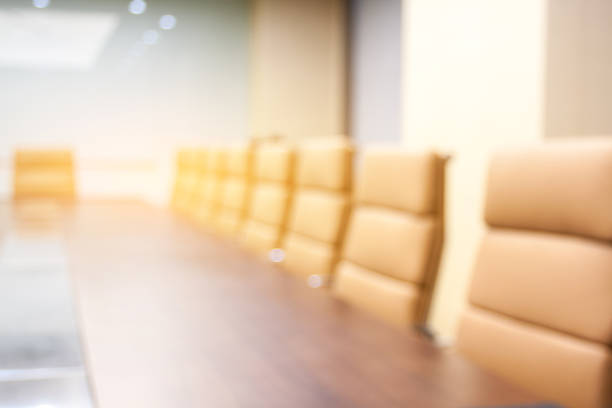 istock Blurred interior of modern meeting room design 1402059785