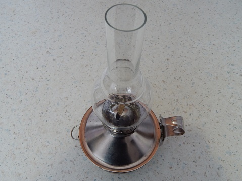 Metal kerosene lamp with glass dome