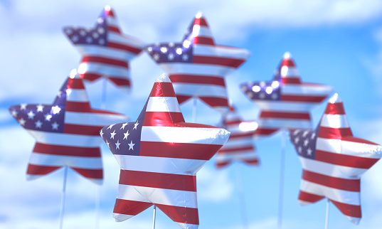 American flag patterned balloons in the sky. 4th Of July Concept.