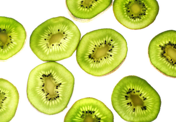 istock Piece of kiwi fruit cut into slices on a white background 1402067284