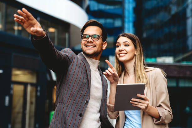 istock Two creative business people working on social media strategy using a digital tablet 1402070924