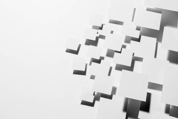 White abstract geometric background with fly rhombuses in hard light with dark gradient contrast black shadows, as border, copy space, top view. Simple mosaic backdrop in minimalist style.