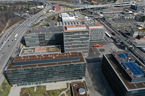 Bern Wankdorf City with several new office buildings. This new City district of Bern was completed in 2020. Along with others Wankdorf City exists of the SBB Railway and Swiss Post Headquarters. The image was captured during springtime.