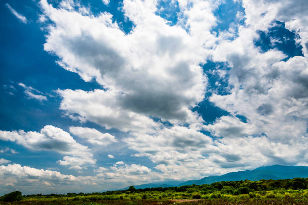 Mountain with blue sky and clouds background