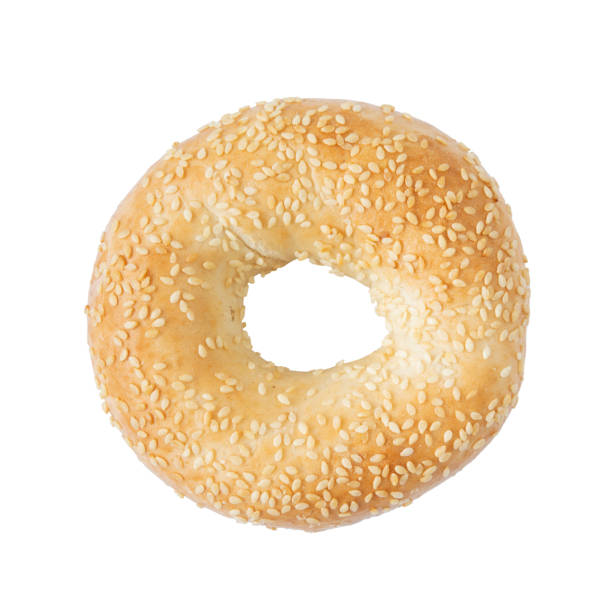 istock Sesame bagel bun isolated on white background, top view 1402079093