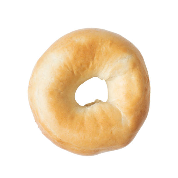istock Wheat bagel bun isolated on white background, top view 1402079220