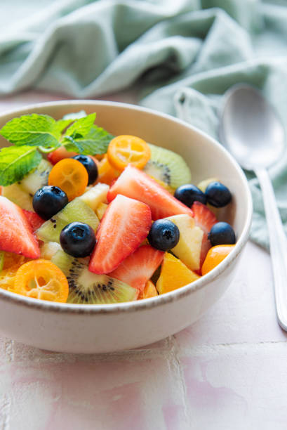 istock Healthy fresh fruit salad in a bowl 1402079384