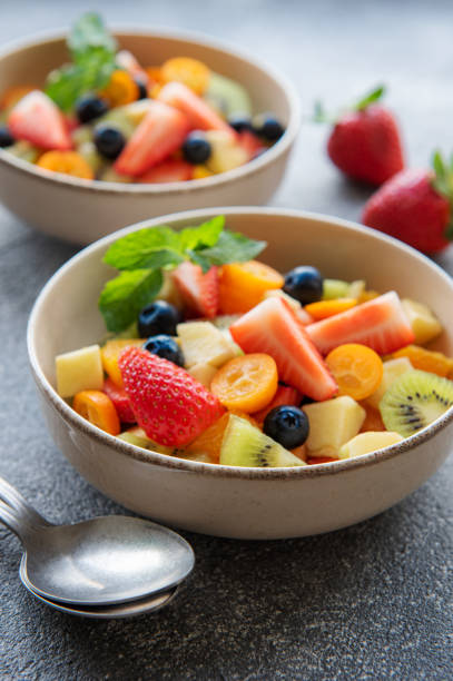 istock Healthy fresh fruit salad in a bowl 1402079403