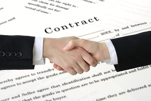 Businessmen shaking hands each other, completion fo contract images