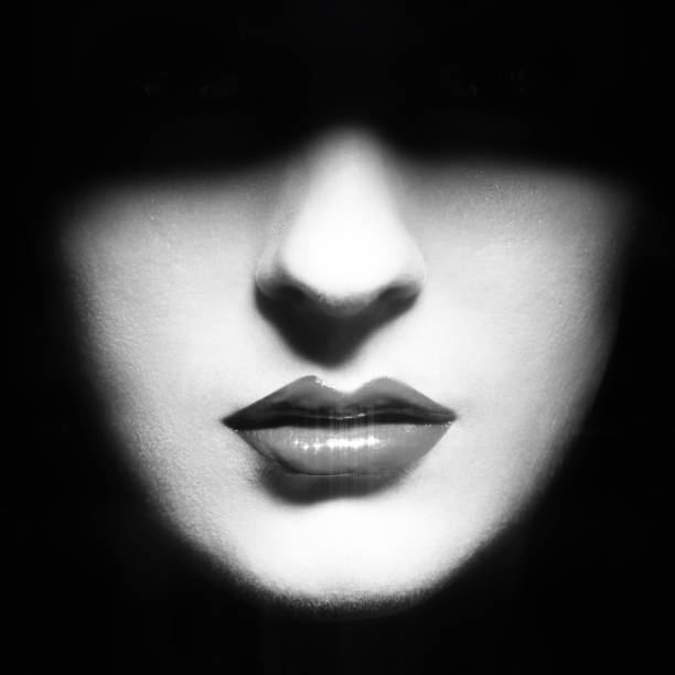 istock Close up woman face with red and sparkling lips 1402085913