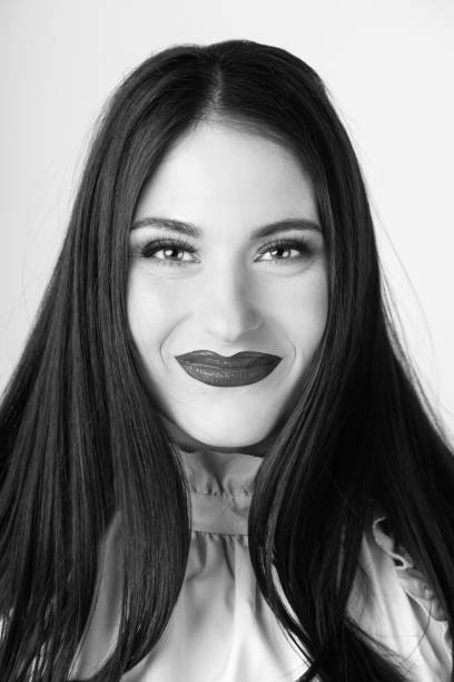 istock Close-up beautiful woman with red lips portrait 1402086194